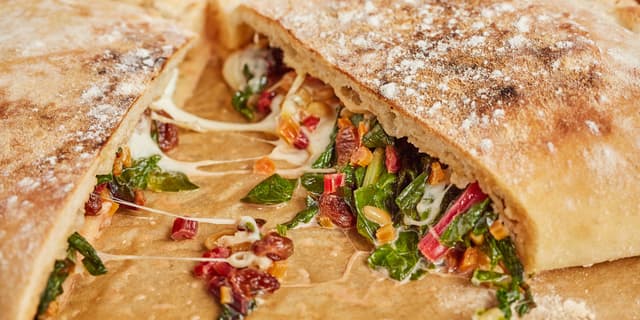 Calzone di verdura – Swiss chard, mozzarella, pine nut and raisin calzone